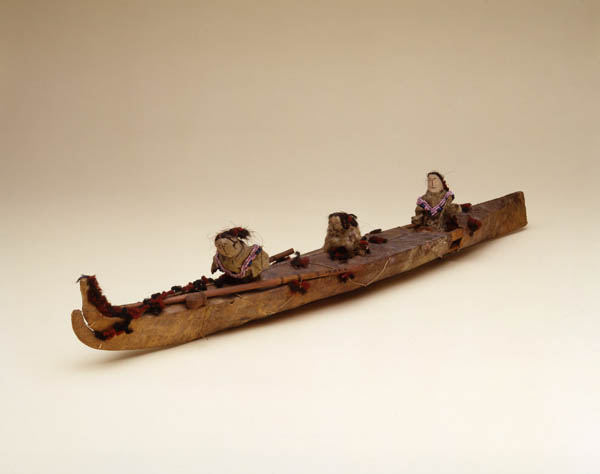 Kayak Model. Made of skin and wood, with three human figures, as well as paddles and other accessories from Kodiak Island, Alaska, United States. Photograph by Karen Mauch and John Chew. Penn Museum image #151933